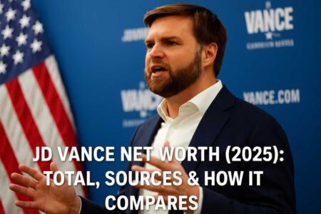 JD Vance speaking in front of an American flag and campaign backdrop.